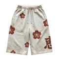 恵 Megumi Grace Short — front, on white
